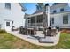 Backyard patio with elegant wicker dining and sitting furniture perfect for outdoor entertaining at 3858 Sawyers Island Dr, Mount Pleasant, SC 29466