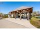 Community pavilion with picnic tables and BBQ area near the lake, perfect for outdoor community fun at 3858 Sawyers Island Dr, Mount Pleasant, SC 29466
