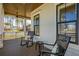 Relaxing front porch with rocking chairs, offering a cozy outdoor space to enjoy the neighborhood view at 3858 Sawyers Island Dr, Mount Pleasant, SC 29466