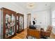 Elegant home office with built-in cabinets, a comfortable chair, and a functional workspace at 3858 Sawyers Island Dr, Mount Pleasant, SC 29466