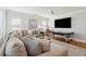 Spacious living room with a large sectional sofa, a pool table, and a large TV at 3858 Sawyers Island Dr, Mount Pleasant, SC 29466