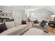 Bright living area featuring hardwood floors, neutral furniture, and a cozy, welcoming atmosphere at 3858 Sawyers Island Dr, Mount Pleasant, SC 29466