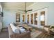 Spacious outdoor patio featuring comfortable seating with an overhead ceiling fan and a calming atmosphere at 3858 Sawyers Island Dr, Mount Pleasant, SC 29466
