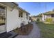 Backyard of home featuring a gravel path and shaded seating area at 418 Geddes Ave, Charleston, SC 29407