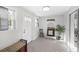 Entryway with patterned tile floors and a brick fireplace at 418 Geddes Ave, Charleston, SC 29407
