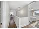 Hallway features a pendant light, hardwood floors, and leads to the bedroom at 418 Geddes Ave, Charleston, SC 29407