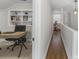Hallway and bright office space with built-in shelving and natural light at 418 Geddes Ave, Charleston, SC 29407