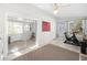 Sunroom with tile flooring, a sliding glass door, and an exercise bike at 418 Geddes Ave, Charleston, SC 29407
