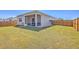 Well-maintained backyard with a screened-in porch and a wood fence at 430 Eastern Pine Dr, Summerville, SC 29486