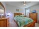 Cozy bedroom with a wooden bed, a window providing natural light, and wood furniture at 430 Eastern Pine Dr, Summerville, SC 29486