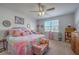 Bright bedroom with a plush bed, window, ceiling fan, and ample natural light for a restful retreat at 430 Eastern Pine Dr, Summerville, SC 29486