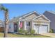 Attractive home with manicured front yard and American flag decor at 430 Eastern Pine Dr, Summerville, SC 29486