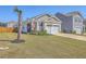 Charming home with a well-manicured lawn and inviting curb appeal at 430 Eastern Pine Dr, Summerville, SC 29486