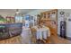 Open concept living room and dining area with hardwood floors and lots of natural light at 430 Eastern Pine Dr, Summerville, SC 29486