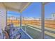 Relaxing screened porch with cozy seating and pleasant backyard views at 430 Eastern Pine Dr, Summerville, SC 29486