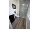 Bathroom with modern vanity, toilet, and shower with glass door, providing a comfortable retreat at 431 Otis Rd, Walterboro, SC 29488