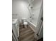 Bathroom featuring a modern vanity with white cabinets, a toilet, and a bathtub with shower at 431 Otis Rd, Walterboro, SC 29488