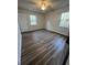 Bedroom with two windows and ceiling fan offering a comfortable living space at 431 Otis Rd, Walterboro, SC 29488