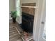 Living room featuring a charming fireplace with brick surround and decorative mantel at 431 Otis Rd, Walterboro, SC 29488