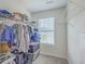 Walk-in closet with organized shelving, providing ample storage space for clothing and accessories in a neat and efficient manner at 436 Thoroughbred Dr, Moncks Corner, SC 29461