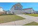 Beautiful two-story home featuring a two-car garage and manicured landscaping at 436 Thoroughbred Dr, Moncks Corner, SC 29461