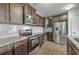Modern kitchen featuring stainless steel appliances, granite countertops, and ample cabinetry at 436 Thoroughbred Dr, Moncks Corner, SC 29461