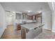 Bright kitchen featuring stainless steel appliances, granite countertops, and a large island at 436 Thoroughbred Dr, Moncks Corner, SC 29461