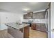 Spacious kitchen with granite countertops, stainless steel appliances, and a central island at 436 Thoroughbred Dr, Moncks Corner, SC 29461