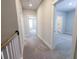 Hallway with carpet and two doorways leading to other rooms at 444 Parish Farm Dr, Summerville, SC 29486