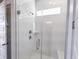 Glass-enclosed shower with white subway tile, chrome fixtures, and a built-in bench at 444 Parish Farm Dr, Summerville, SC 29486