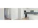 Open floor plan of the kitchen looking to adjacent hall and rooms at 475 Queenview Ln, Charleston, SC 29414