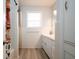Bathroom features white tile, a shower-tub combo, and modern fixtures at 5040 Lancaster St, North Charleston, SC 29405