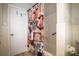 This stylish bathroom boasts wood floors, white walls, and a western theme shower curtain at 5040 Lancaster St, North Charleston, SC 29405