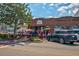 EVO Attorneys at Law business with outdoor seating, landscaping, and a bright blue SUV parked out front at 5040 Lancaster St, North Charleston, SC 29405