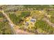 Secluded country estate featuring a home, shop, and pond amid a picturesque wooded landscape at 508 Horse Trail Rd, Saint George, SC 29477