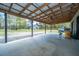 Spacious barn with a covered area overlooking the grounds, offering an ideal spot for outdoor activities at 508 Horse Trail Rd, Saint George, SC 29477