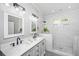 Bathroom with a double vanity and a beautifully tiled walk-in shower at 508 Horse Trail Rd, Saint George, SC 29477