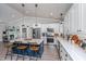 Modern kitchen with white cabinetry, stainless steel appliances, a marble island, and hardwood floors at 508 Horse Trail Rd, Saint George, SC 29477