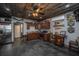 Rustic kitchen featuring a wood ceiling, stainless steel appliances, and custom wood cabinetry at 508 Horse Trail Rd, Saint George, SC 29477