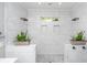 Walk-in shower with dual showerheads and decorative plants at 508 Horse Trail Rd, Saint George, SC 29477