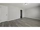 Bedroom featuring gray wood flooring and light gray walls at 5314 Albert St, North Charleston, SC 29418