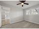 Bedroom featuring windows, wood-look floors, and neutral paint scheme at 5314 Albert St, North Charleston, SC 29418