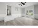Open living space with modern gray flooring and updated lighting fixture at 5314 Albert St, North Charleston, SC 29418