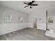 Open living space with modern gray flooring and updated lighting fixture at 5314 Albert St, North Charleston, SC 29418