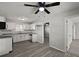 Open living space with modern gray flooring and updated lighting fixture at 5314 Albert St, North Charleston, SC 29418