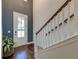 Entryway featuring hardwood floors, staircase, and plenty of natural light at 5525 Alpine Dr, Summerville, SC 29483