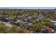 Aerial view of a residential neighborhood, highlighting the diverse architectural styles and lush greenery at 56 Parkwood Ave, Charleston, SC 29403