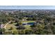 Breathtaking aerial view of park featuring walking trails and ponds, with a cityscape visible in the distance at 56 Parkwood Ave, Charleston, SC 29403