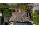 Aerial view of a home's roof featuring architectural design and surrounding landscape at 56 Parkwood Ave, Charleston, SC 29403