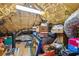 Unfinished attic space with exposed insulation, utilities, and stored items at 56 Parkwood Ave, Charleston, SC 29403